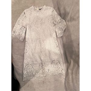 Womens white lace dress fits a size S/M